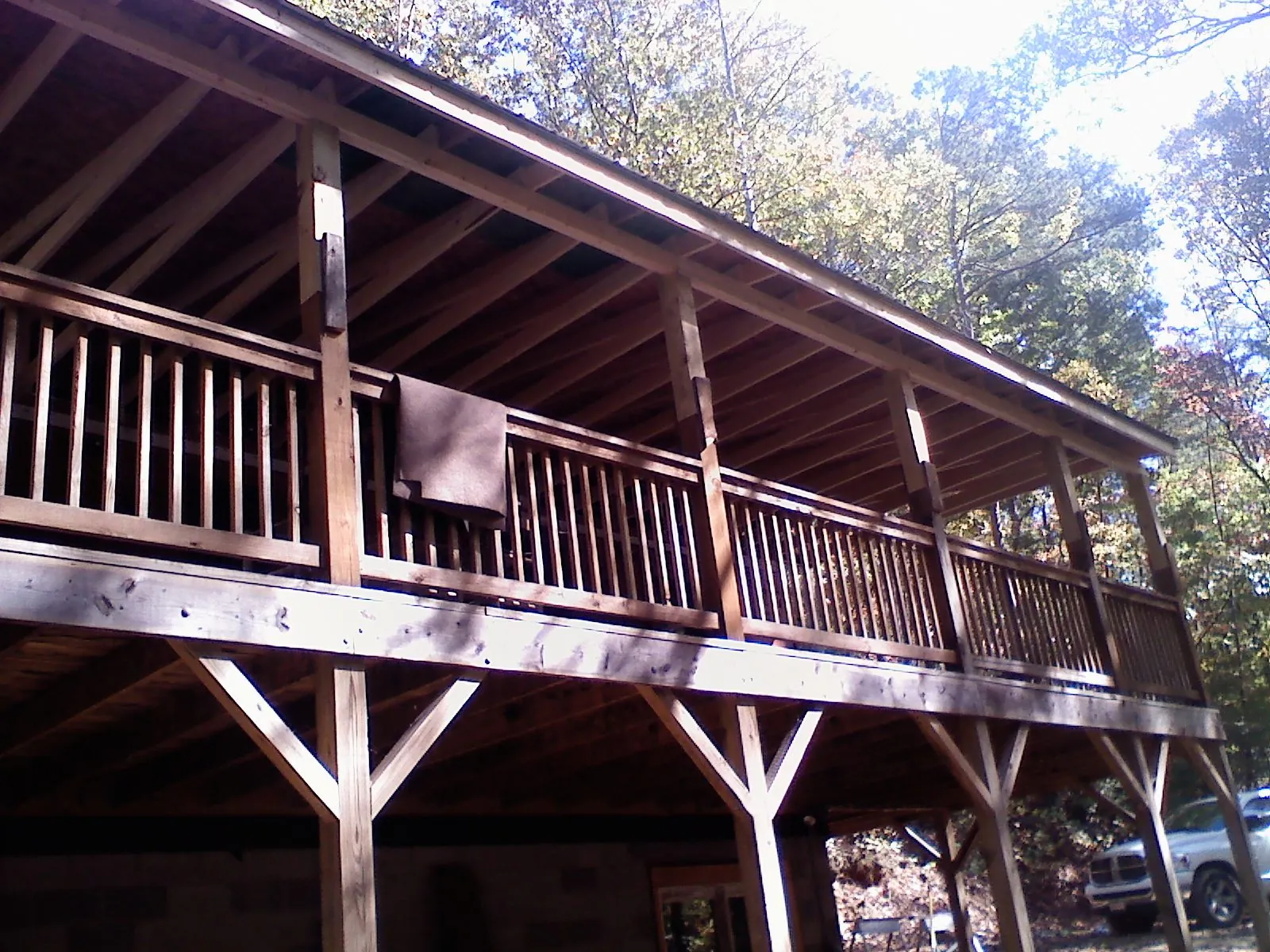 Timber framing under a new elevated porch and deck — Roof Leak Repair in Metairie by Roofing Brothers